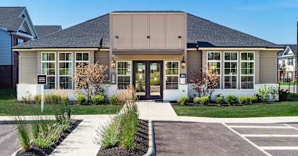 the front of a house with a sidewalk and grass at Overland Park, Pickerington, 43147