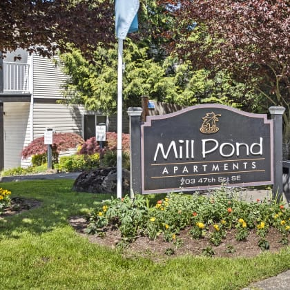 a sign that says mill pond apartments at Mill Pond Apartments, Auburn Washington