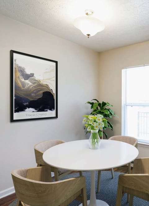 a dining room with a table and chairs at Chariot Pointe Apartments, Murfreesboro, 37130