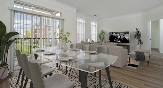 A modern dining room with a glass table and chairs.at Arlington Park, Hilliard, OH 43026