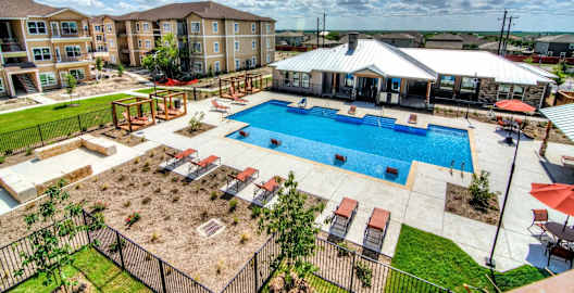 take a dip in our resort style pool at Villa Espada Apartments, San Antonio, Texas
