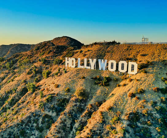 The Hollywood sign is displayed on a hillside.