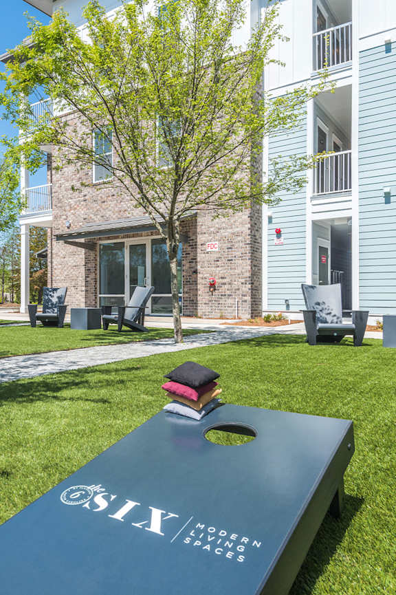 Courtyard with Yard Games at The Six, Mount Pleasant