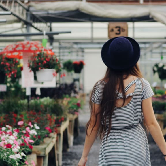 Woman at flower shop at Clearwater in Post Falls, ID