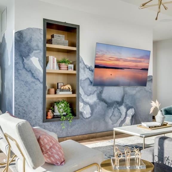 a living room with couches and a table