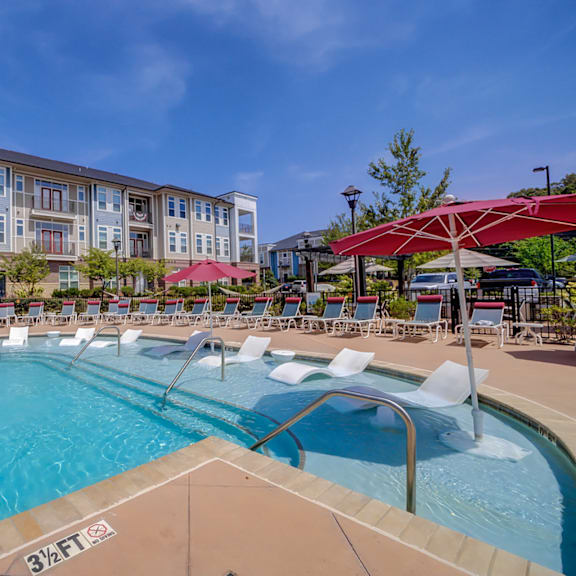 A large swimming pool with a 3 feet depth marking.