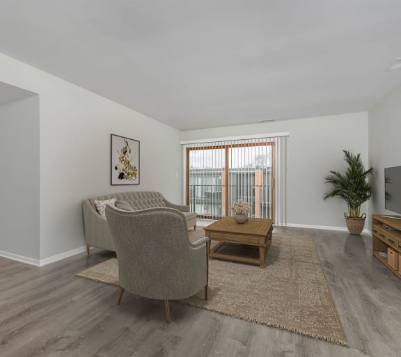 a living room with a couch and a table