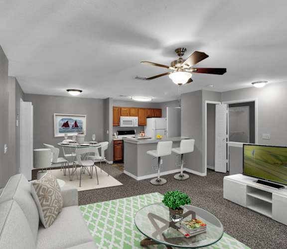 a living room with a couch a table and a tv