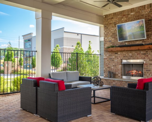 Poolside Lounge with Fireplace and Mounted TV