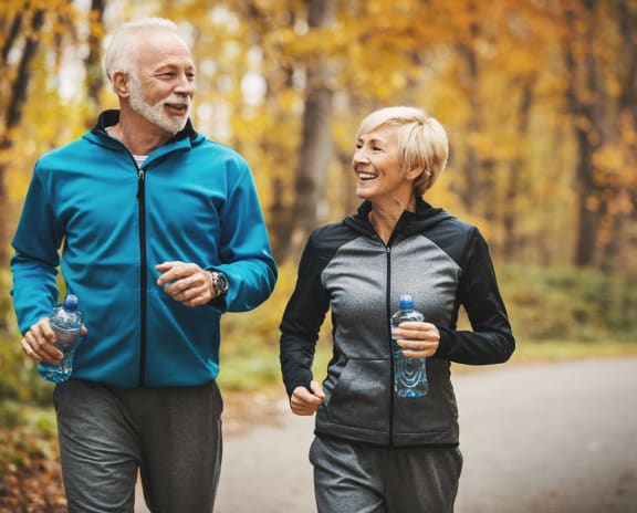 Older couple jogging