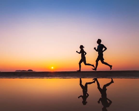 runners on beach