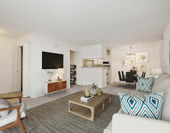 a living room with a couch and a table at Summit Creek, Canton, MI 48188