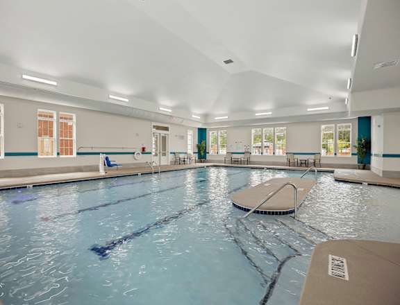 A large indoor swimming pool with lanes marked for swimming at Ellis Station, NC, 27703