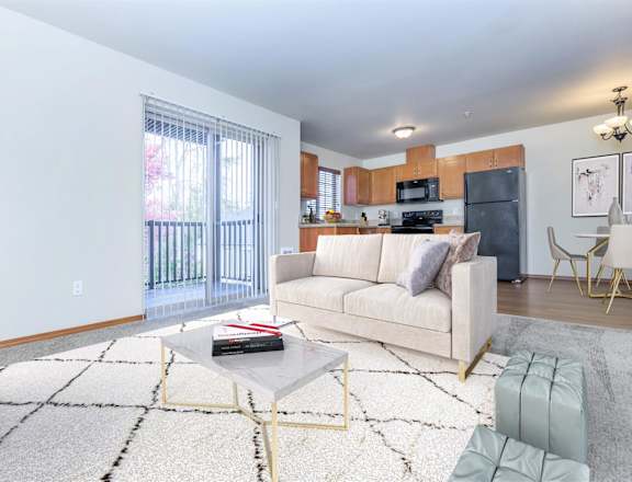 a living room with a couch and a table