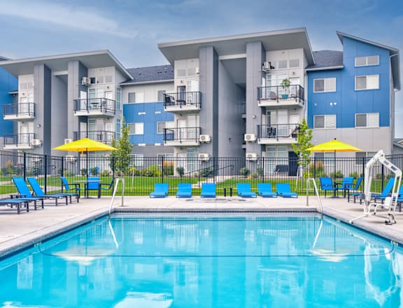 The Northern at Coeur d'Alene Place Apartments Pool with Lounge Chairs