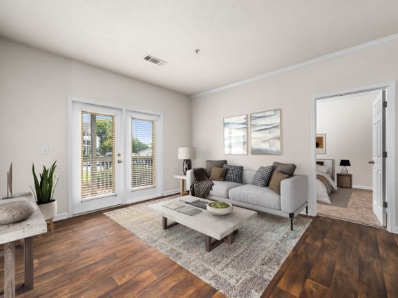 Spacious Living Area With Wood-Style Flooring