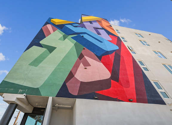 A large, colorful mural on the side of a building.at The Jayne, Los Angeles