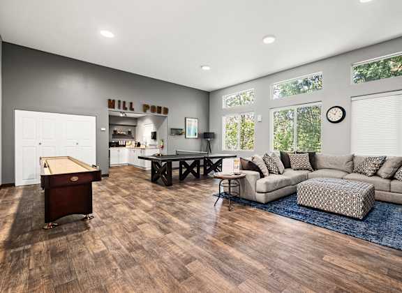 the reserve at bucklin hill games room with pool table and foosball at Mill Pond Apartments, Auburn, WA 98092
