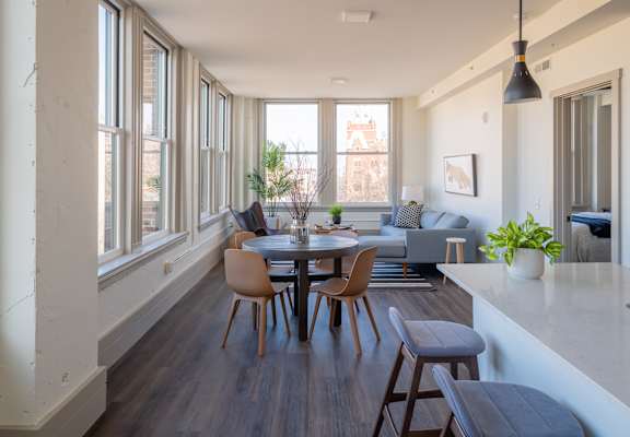 a view of the living room and dining area at The Nicholas, St Louis, Missouri