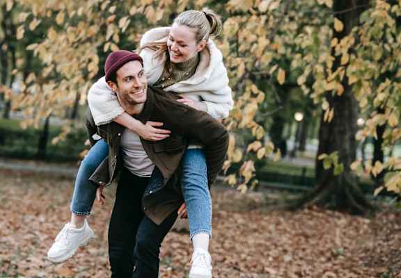 Couple in fall at Windmill Apartments, Colorado