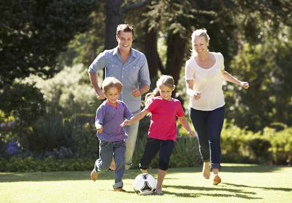 Family Running in a Park at The Montecito, Colorado Springs