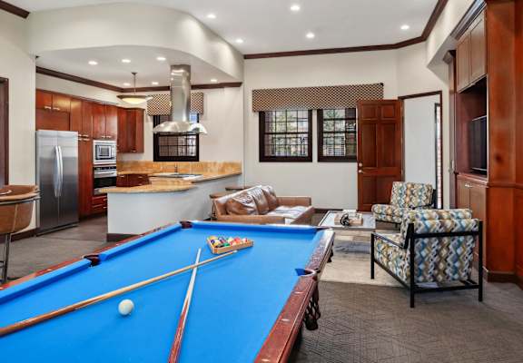 social area with billiards at Red Hawk Ranch apartments