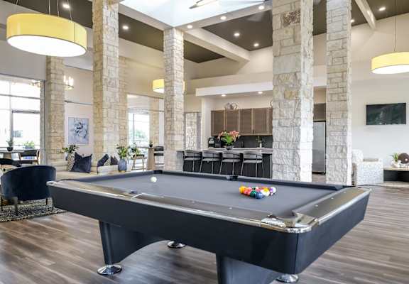 social lounge with billiards at The Allure apartments