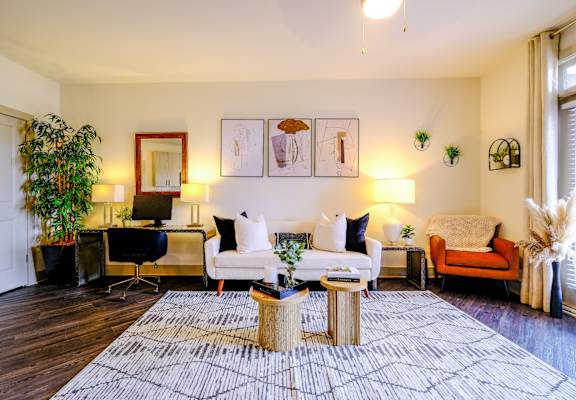a living room with a couch and a table