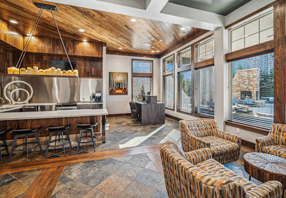 resident kitchen and mingle area at Berkshire Aspen Grove apartments