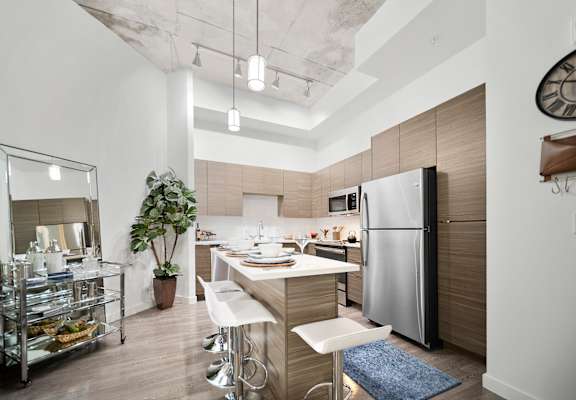 Kitchen and Dining Area at Altis Grand Central Apartments in Tampa, FL