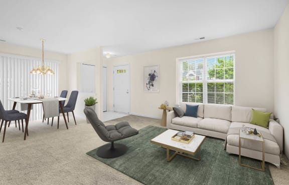 a living room with a couch and a table at Wyndchase, MI 48147