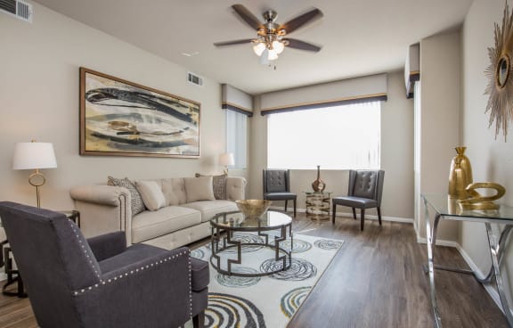 Living room with frame and lamps at The Fairways by Picerne, Las Vegas, Nevada
