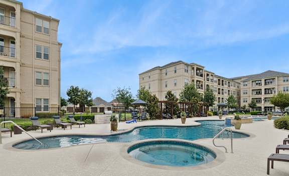resort-inspired swimming pool and spa at Retreat at Wylie 55+ senior apartments