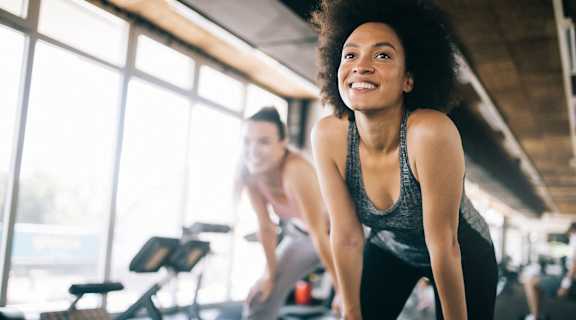 a group of women working out in a gym