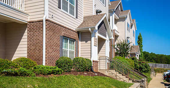 Lush Landscaping In Front Of Ashton Creek Farms Apartment Homes