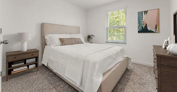 A bedroom with a large bed and a window with blinds.
