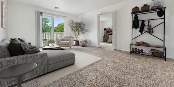 an empty kitchen with white cabinets and a white rug