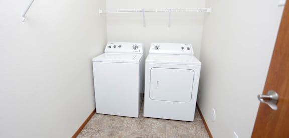 a washer and dryer in a laundry room