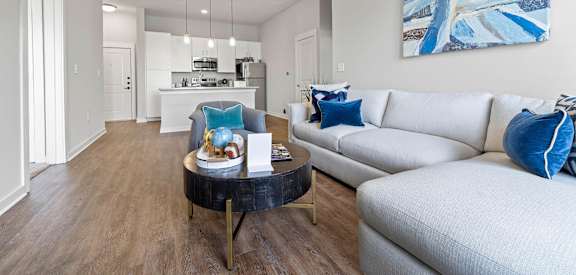 a living room with couches and a coffee table
