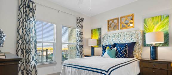 Bedroom With Ceiling Fan at McCarty Commons, San Marcos