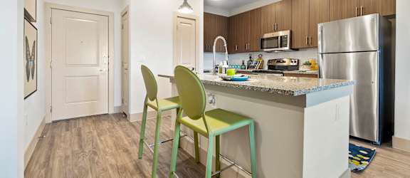Gourmet Kitchen With Island at McCarty Commons, San Marcos
