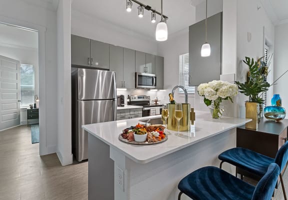 Open and bright kitchen at Reveal at Onion Creek, Austin