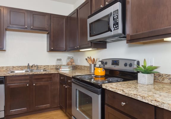Fully Furnished Kitchen With Stainless Steel Appliances at The Pradera in Richardson Texas