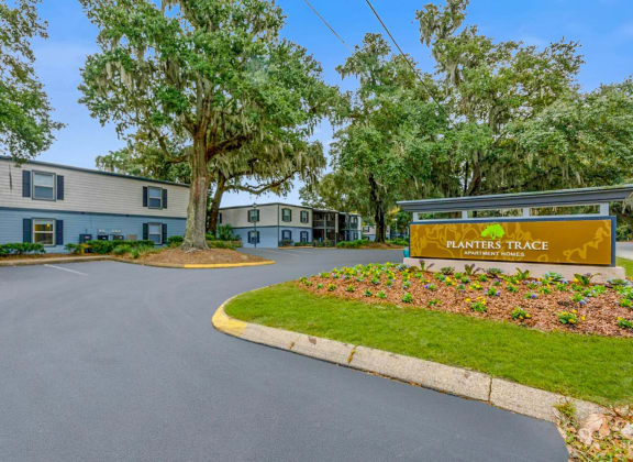 our apartments offer a parking lot in front of the building at Planters Trace, Charleston, SC