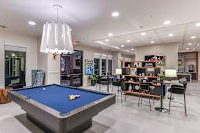 Clubhouse with Billiards at The Exchange Luxury Apartments in St. Petersburg, FL