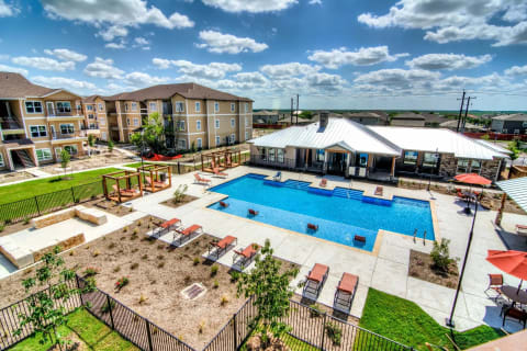 take a dip in our resort style pool at Villa Espada Apartments, San Antonio, Texas