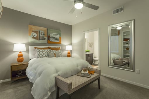 Bedroom decor with lamps with ceiling fan at The View at Horizon Ridge, Henderson, NV