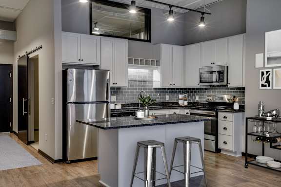 Kitchen with Granite Countertops and Stainless Steel Appliances