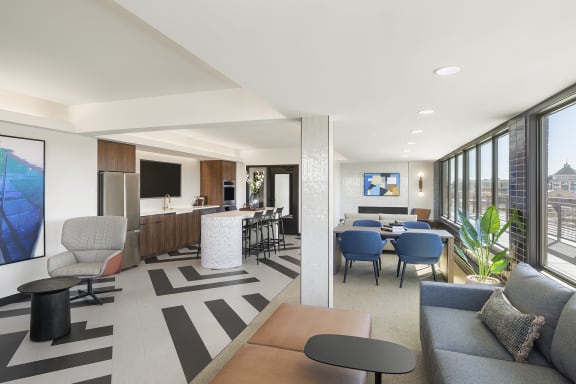 a rendering of a living room with a kitchen and a dining room