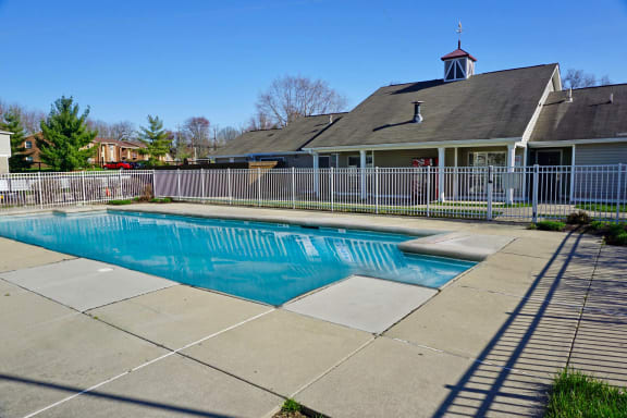 a swimming pool in front of a house at Olive Branch Townhomes, Ohio, 45103